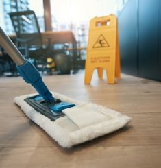 Cleaning,Coworking,Space,With,Special,Mop,,Next,To,Folding,Stepladder